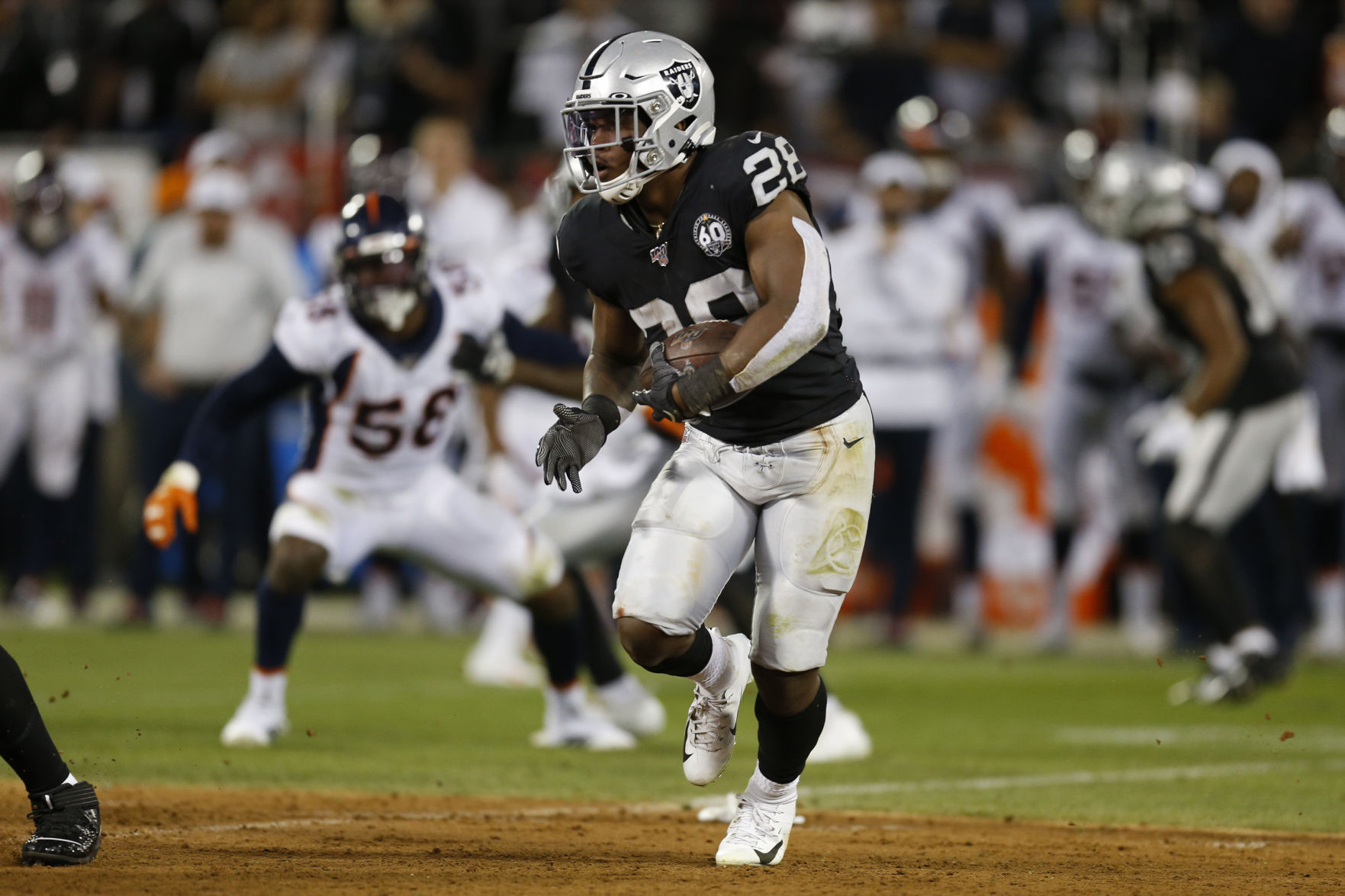 Broncos Raiders Football